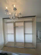 Ivory wardrobe offering plenty of short and long hanging, fitted in Ingleby Barwick